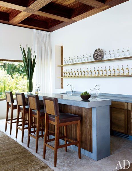 Clooney’s travertine-top bar is stocked with Casamigos tequila.